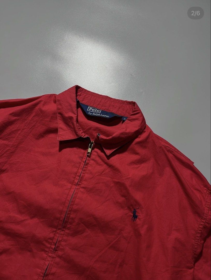 Polo Ralph Lauren Red Harrington (Category: Coats, Jackets and Outerwear) located in Quezon City. Submitted by elsuperiormnl (Listing ID 1462338230, Image 2). Description: - Red Polo Ralph Lauren jacket - Size: Medium (M) - Full zip closure - Collared neckline - Classic Polo logo embroidered on chest - Ideal for layering.
