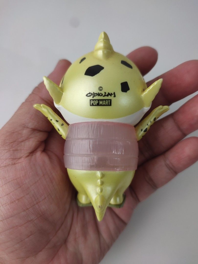 Pop Mart Fish Figure Yellow (Category: Designer & Blind Box Toys) located in Manila. Submitted by epicmountain-f20453 (Listing ID 1462359592, Image 3). Description: - Adorable yellow fish figure from Pop Mart. - Features big, expressive eyes and a cute tongue sticking out. - Unique pink ribbed texture on its body. - Ideal for collectors of unique figurines. - Adds a fun touch to any desk or workspace..