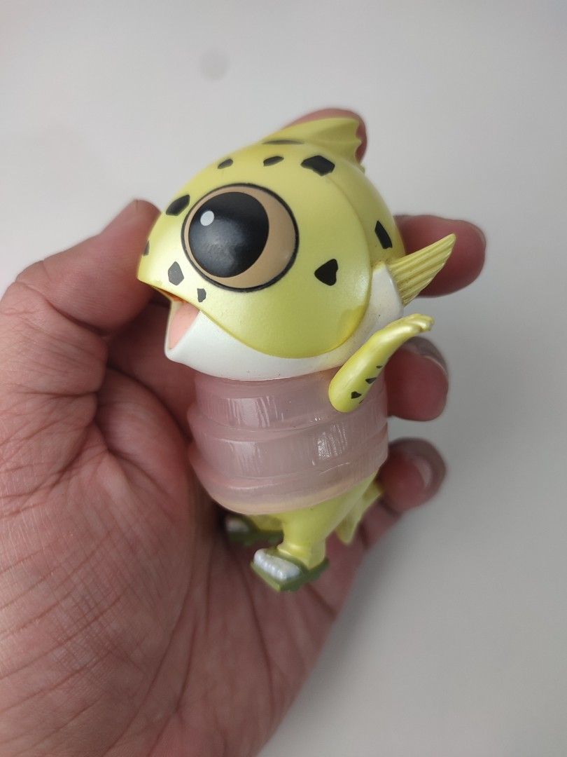 Pop Mart Fish Figure Yellow (Category: Designer & Blind Box Toys) located in Manila. Submitted by epicmountain-f20453 (Listing ID 1462359592, Image 2). Description: - Adorable yellow fish figure from Pop Mart. - Features big, expressive eyes and a cute tongue sticking out. - Unique pink ribbed texture on its body. - Ideal for collectors of unique figurines. - Adds a fun touch to any desk or workspace..