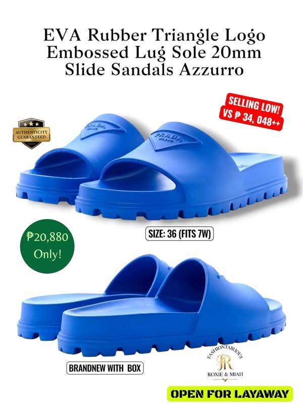 PRADA EVA RUBBER TRIANGLE LOGO SLIDES — AZZURRO BLUE ✨💙 (Category: Sneakers & Footwear) located in Mandaluyong City. Submitted by luxprelovedbagsparadise (Listing ID 1462407951, Image 2). Description: 💙✨ PRADA EVA RUBBER TRIANGLE LOGO SLIDES — AZZURRO BLUE ✨💙 Minimalist. Sporty. Effortlessly luxe. 💎 Step into elevated everyday style with these PRADA EVA Rubber Triangle Logo Slide Sandals in a stunning Azzurro Blue. 💙 The vibrant blue tone pa