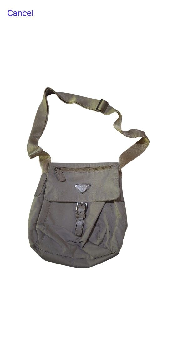 Prada Nylon Crossbody Bag Beige (Category: Luxury Bags & Wallets) located in General Santos City (Dadiangas). Submitted by Abu_israfeel_arisha_shareen (Listing ID 1462264701, Image 1). Description: - Durable nylon material - Flap closure with buckle and zip pocket underneath - Adjustable strap for comfortable wear - Interior zip pocket - Ideal for everyday use - Shows some signs of wear.