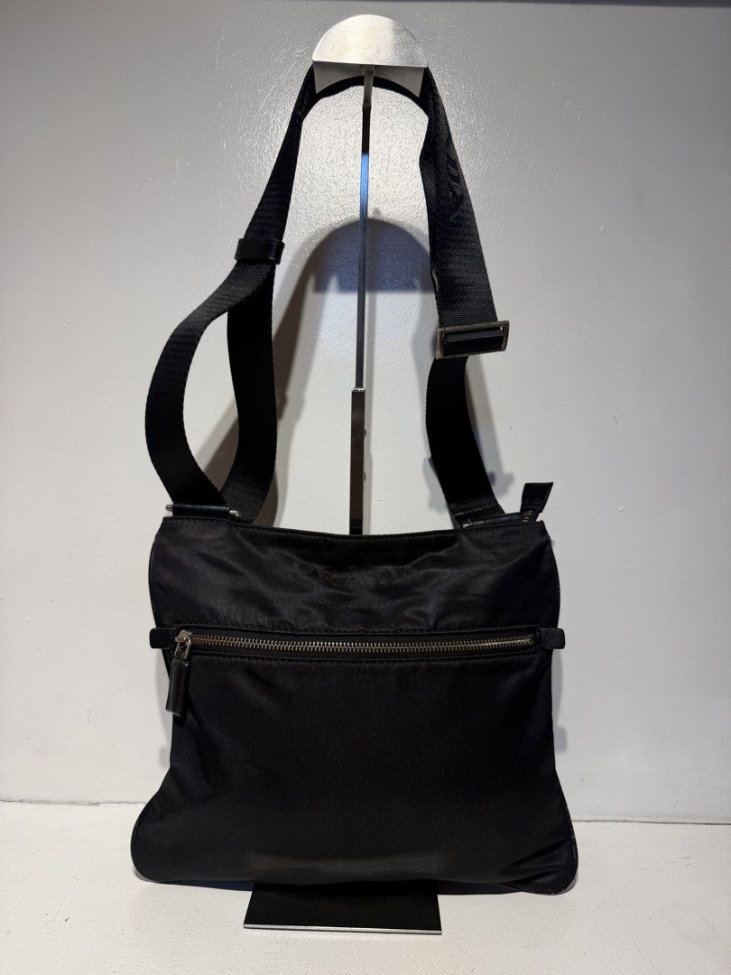 Prada Nylon Messenger Bag (Category: Luxury Bags & Wallets) located in Pasig City. Submitted by armoire_deluxe (Listing ID 1462420831, Image 1). Description: Pre💕 item. In good condition..