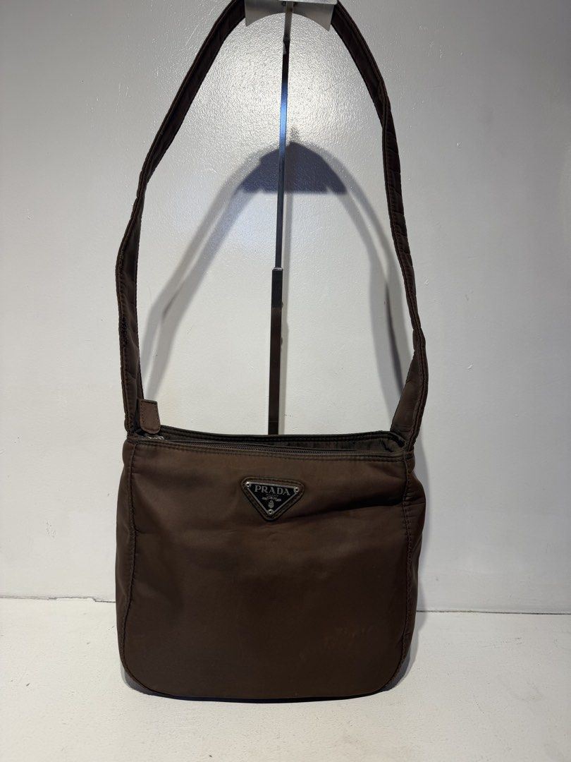 Prada Nylon Shoulderbag (Category: Shoulder Bags) located in Pasig City. Submitted by armoire_deluxe (Listing ID 1462420658, Image 1). Description: Pre💕 item. In good condition..