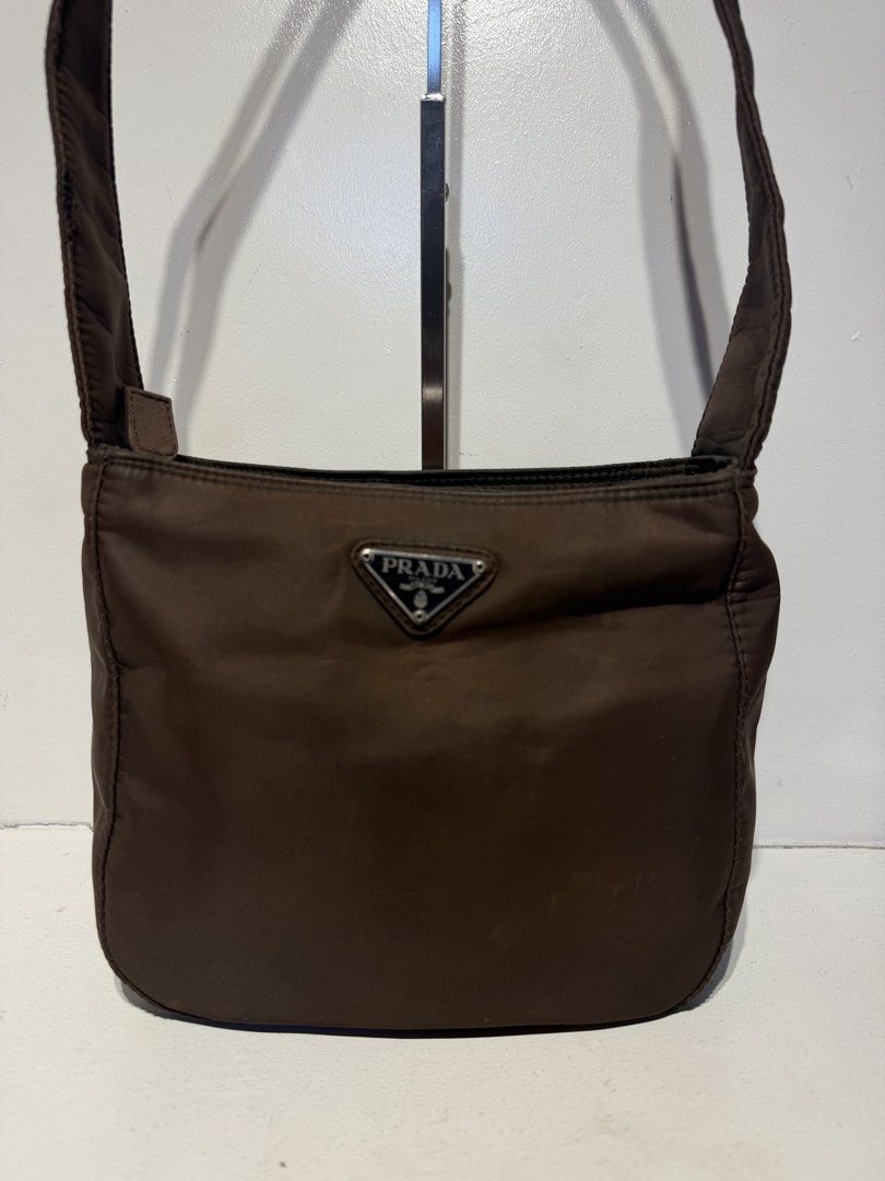 Prada Nylon Shoulderbag (Category: Shoulder Bags) located in Pasig City. Submitted by armoire_deluxe (Listing ID 1462420658, Image 2). Description: Pre💕 item. In good condition..