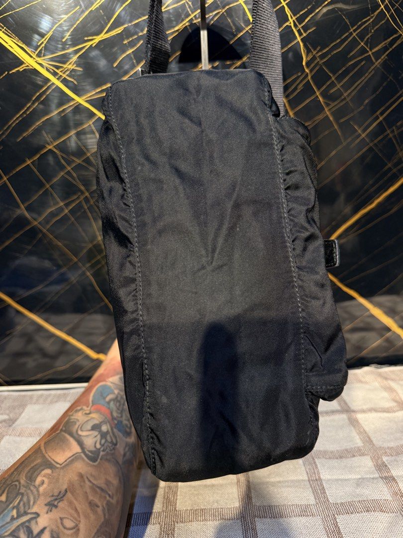 Prada Sling Bags Authentic (Category: Luxury Bags & Wallets) located in Santiago. Submitted by twicebutnice03 (Listing ID 1462306398, Image 3). Description: Authentic Prada Nylon Sling bag Still Good Condition no issue.