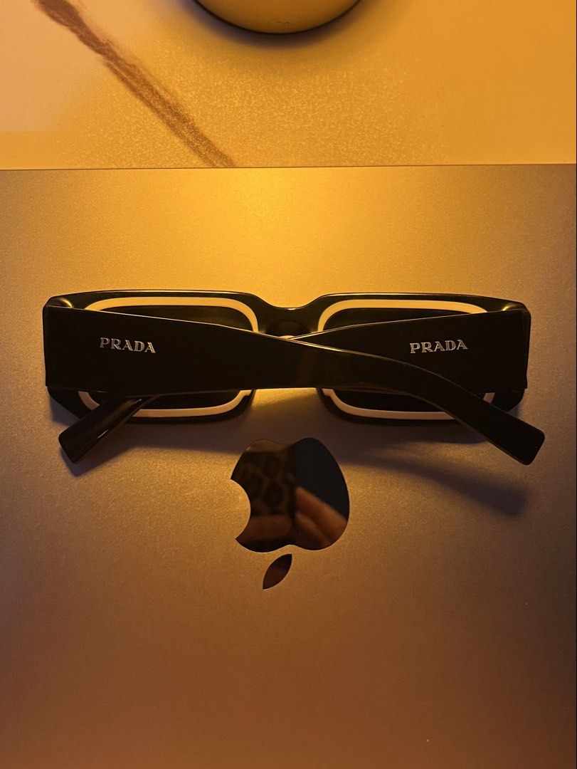 Prada Sunglasses PR 06YS (Category: Sunglasses & Eyewear) located in Bulacan. Submitted by jasminebrnls_ (Listing ID 1462394316, Image 1). Description: - Authentic Prada sunglasses from Canada - No box (misplaced can’t find it anymore ) - No issue - Declutter not using it anymore .