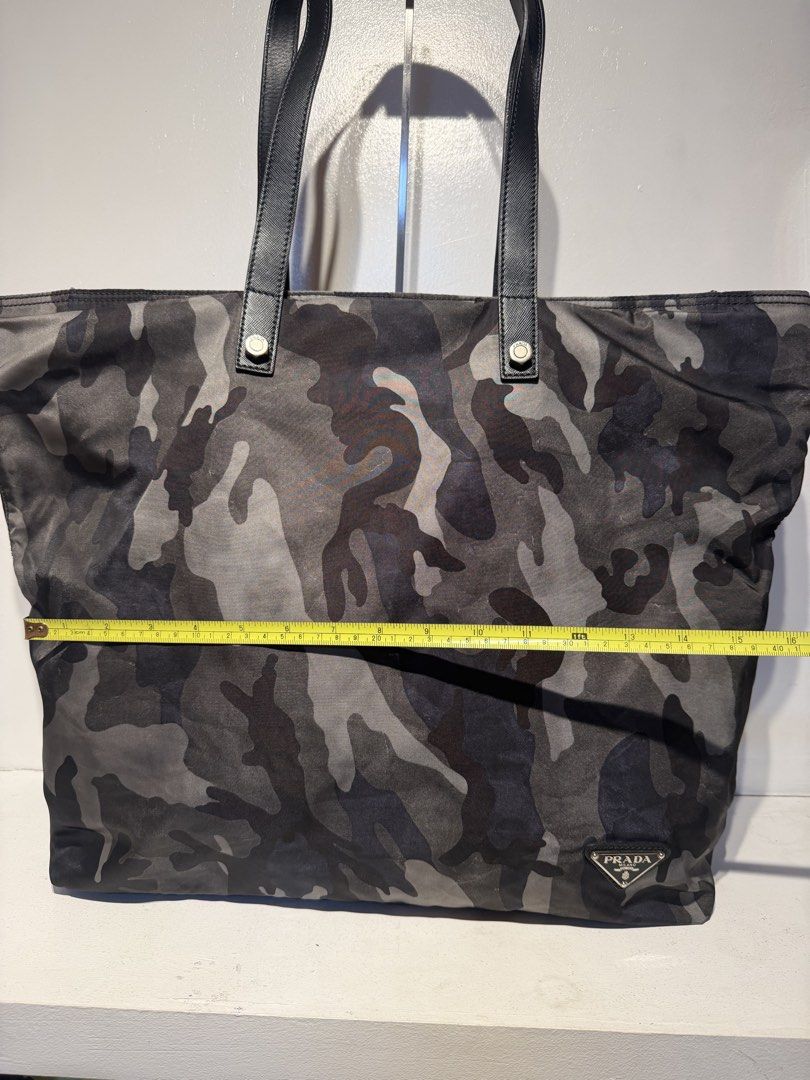 Prada Tessuto Camouflage Tote Bag (Category: Shoulder Bags) located in Pasig City. Submitted by armoire_deluxe (Listing ID 1462420092, Image 2). Description: Pre💕 item. In good condition..