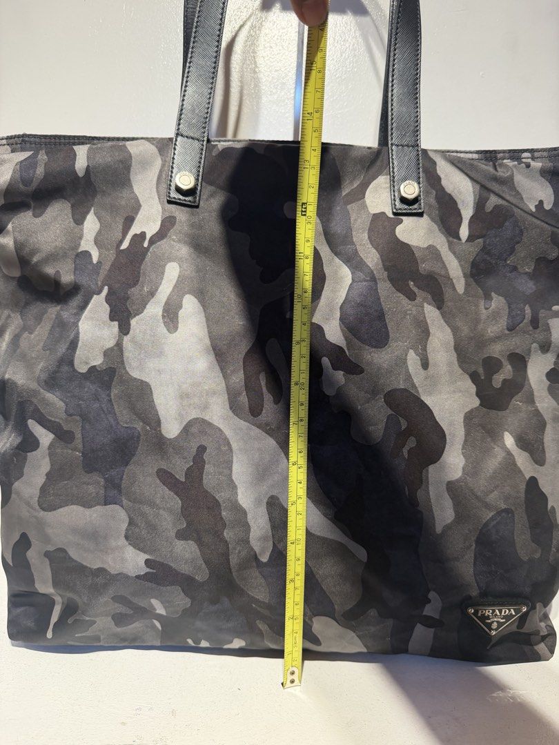 Prada Tessuto Camouflage Tote Bag (Category: Shoulder Bags) located in Pasig City. Submitted by armoire_deluxe (Listing ID 1462420092, Image 3). Description: Pre💕 item. In good condition..