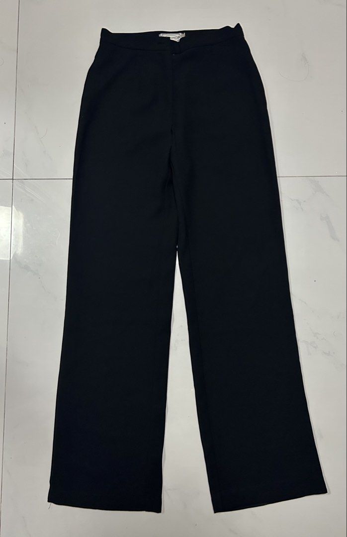 Preloved Black Slacks (Category: Other Bottoms) located in Binan City. Submitted by xyz.closet (Listing ID 1462266998, Image 1). Description: • Preloved blacks slacks • Waistband is not stretchable • 🔴 Issue: Has a small tear in front • RFS: No longer fits MOP: GCash or MariBank MOD: J&T or Lalamove — shipping fee will be shouldered by the buyer Reminders: • Please check all photos carefully and make sure you’re satisfied with the item’s conditi