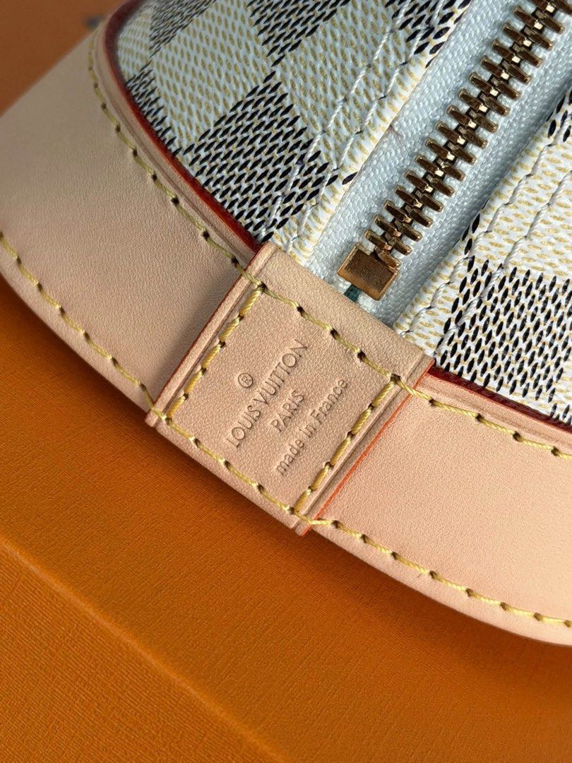 Preloved Lv Damier Azur Canvas (Category: Luxury Bags & Wallets) located in Manila. Submitted by bagsandmanymanymore1 (Listing ID 1462381812, Image 3). Description: Preloved Damier Azur Signature Size 23.5cm(L) x 17.5cm(H) x 11.5cm(W) Coated canvas Damier Azur/Blue Olympe Cowhide leather trim Textile lining Gold toned hardware Double zipper closure 1 inside flat pocket 1 removable address tag Fits smartphone, earphones, keys, sunglasses Strap:Rem