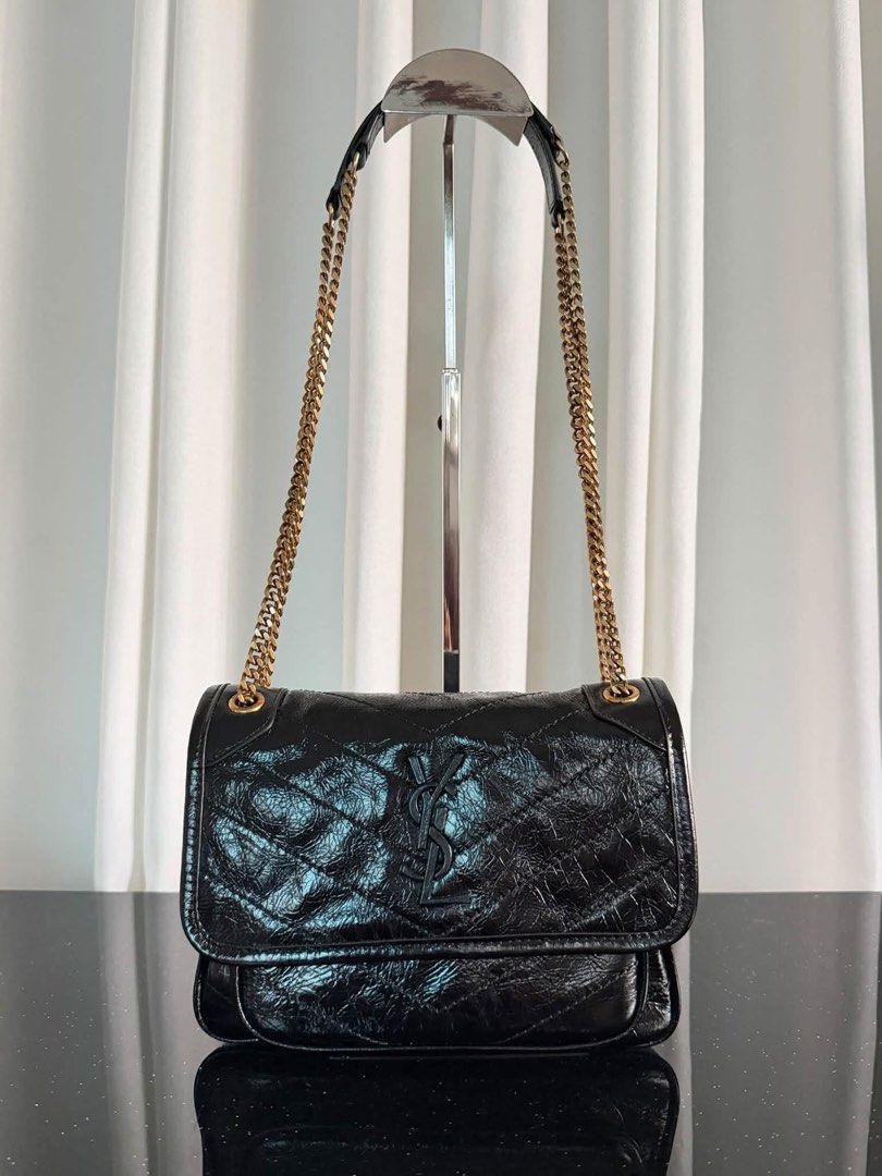 Preloved YSL Niki Medium (Category: Luxury Bags & Wallets) located in Manila. Submitted by bagsandshoesmanymore (Listing ID 1462338874, Image 1). Description: Preloved Ysl Niki Size 24cm What you see is what you get Gold bronze hardware .