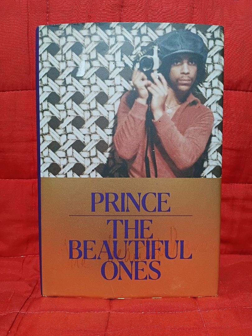 Prince: The Beautiful Ones (Category: Storybooks) located in Manila. Submitted by krishna_ayanami (Listing ID 1462437497, Image 1). Description: - Book Title: Prince: The Beautiful Ones - Content: Features Prince's own writings and photography. - Condition: Excellent, well-preserved. - Ideal for: Prince enthusiasts and collectors. - A rare glimpse into the artist's personal world..