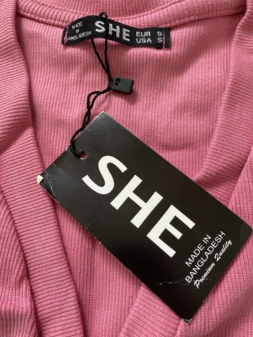 Puff sleeve V Button Down (Category: Others Tops) located in Abucay. Submitted by nicsiey (Listing ID 1462312925, Image 3). Description: Puffsleeve V Button Down Rib Thick Stretch Fabric Never used. Color: Pink Size: S Bust - 15” Length - 17”.