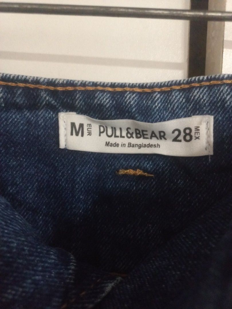Pull & Bear Denim Skirt with Belt Size 28 (Category: Skirts) located in Manila. Submitted by maryjoyenc89891 (Listing ID 1462317724, Image 2). Description: - Pull & Bear blue denim skirt - Size 28 - Features a tie belt at the waist - Classic five-pocket styling - Made in Bangladesh - Ideal for casual wear.