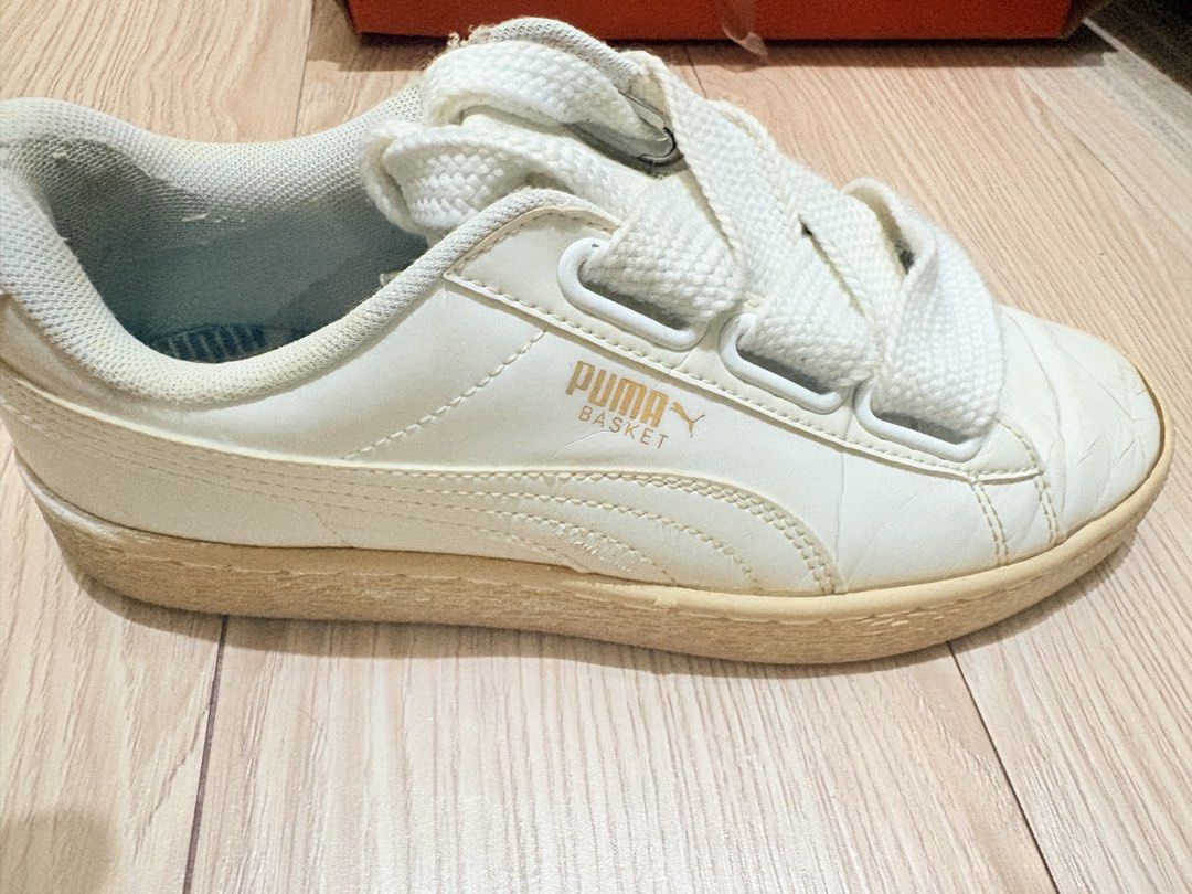 Puma Basket White Leather Sneakers (Category: Sneakers) located in Manila. Submitted by wildforest_de8e6f (Listing ID 1462373843, Image 1). Description: - White Puma Basket sneakers - Genuine leather material - Size 37 EU - Minor creasing on toe box - Slight scuffing on sole - Thick white laces - Made in Vietnam.