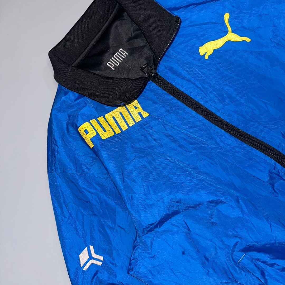 Puma Windbreaker Jacket (Category: Coats, Jackets and Outerwear) located in Batangas. Submitted by garment_street (Listing ID 1462328375, Image 2). Description: Puma Windbreaker Jacket issue: (4th slide) ✔️Good condition 💰 Payment first 📦 Shipping fee: Buyer’s responsibility. 📩DM us to claim yours. *Used item. Please manage expectations. Minor flaws, color differences, or need for washing may apply. DM for questions..