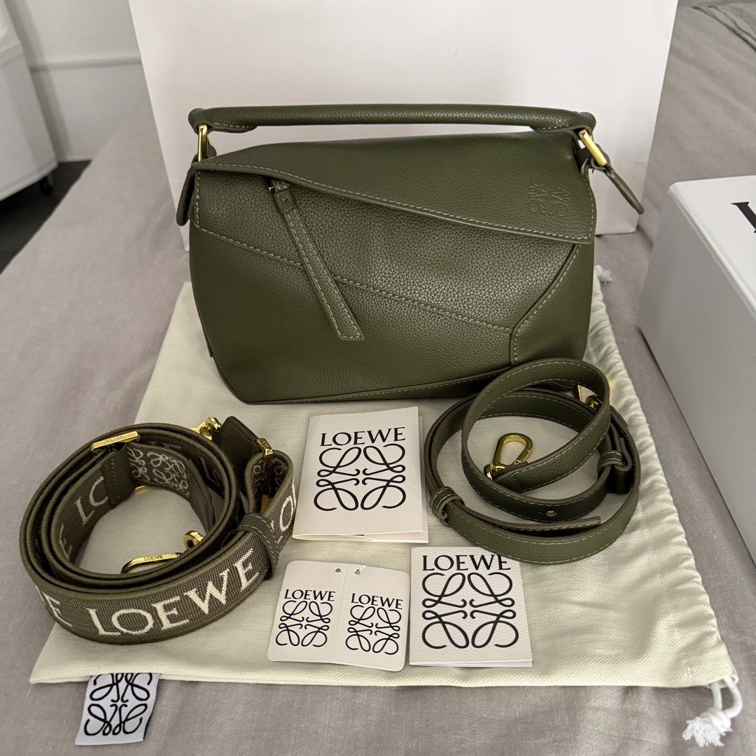 Loewe Puzzle Bag (Category: Luxury Bags & Wallets) located in Makati City. Submitted by imjustagirlxo (Listing ID 1462278406, Image 2). Description: Small Loewe Puzzle Bag in Olive Green Includes Dust bag, original box, shopping bag, and crossbody straps Bought from HK.