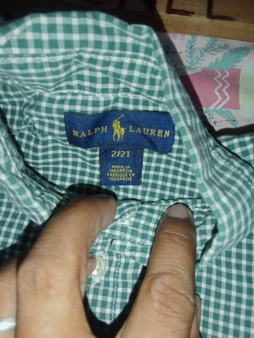 Ralph Lauren Green Gingham Button-Down Shirt 2T (Category: Babies & Kids Fashion) located in Cebu City. Submitted by junelsugar (Listing ID 1462379453, Image 2). Description: - Ralph Lauren Polo Shirt - Size: 2T - Color: Green and White Gingham - Material: 100% Cotton - Features: Classic polo player logo embroidered on chest - Style: Casual or dressy.
