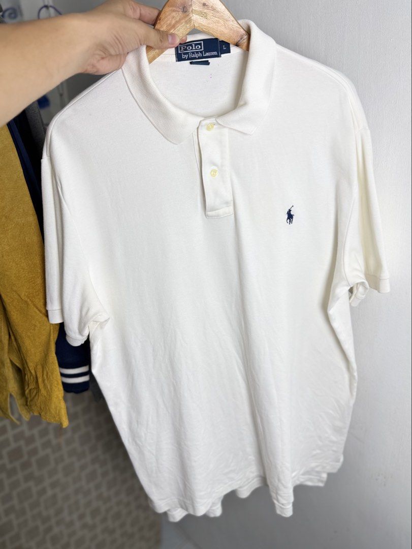 Ralph lauren white polo shirt (Category: Tshirts & Polo Shirts ) located in Daraga. Submitted by casualthread (Listing ID 1462412203, Image 1). Description: Authentic Issue last 4 pic Minimal stain need wash and minimal scratch malapit sa neck tag and slit 22.5-23x29.5 9/10 Large xl.