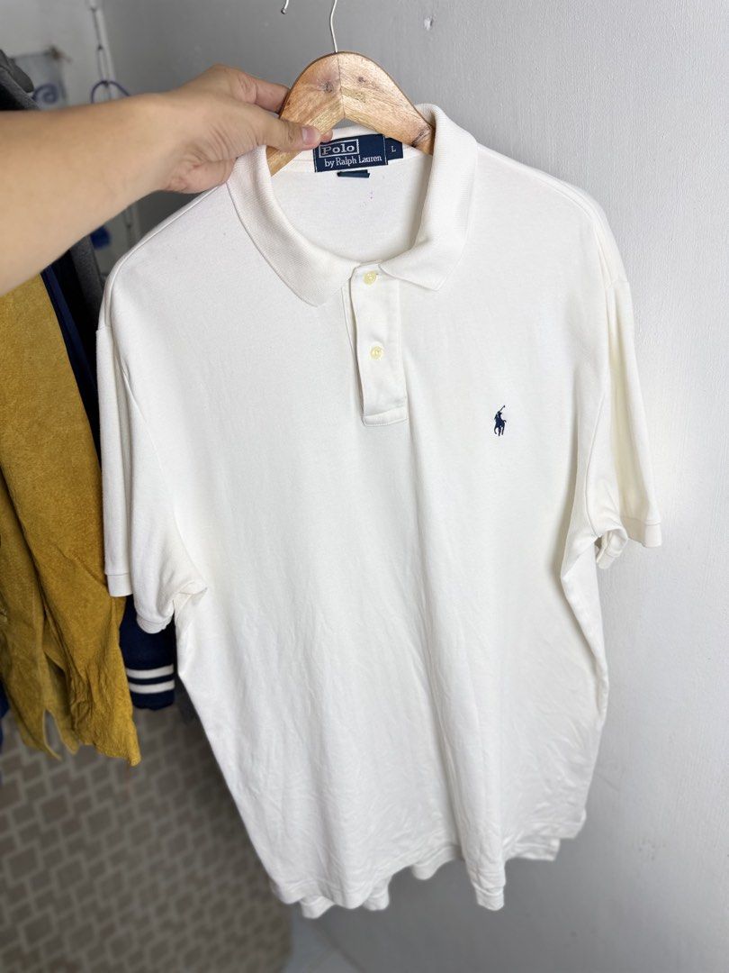 Ralph lauren white polo shirt (Category: Tshirts & Polo Shirts ) located in Daraga. Submitted by mirandillaadrian (Listing ID 1462417616, Image 1). Description: Authentic Issue minimal scratch sa malapit sa necktag and minimal stain. Minimal Sa slit din 22.5-23x29.5 Large to xl 9/10.
