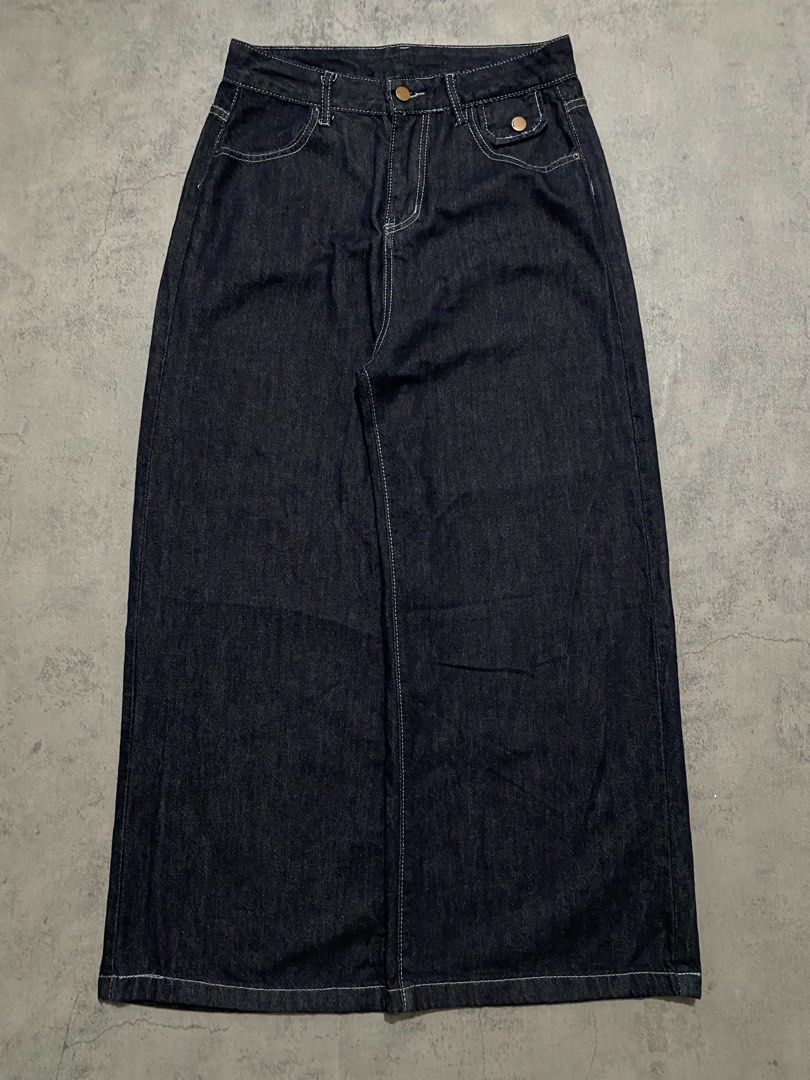 raw denim pants (Category: Jeans) located in Batangas. Submitted by yuellll (Listing ID 1462375688, Image 1). Description: Width:32 Length:42 Thigh:14.5 Hem:13.3 Color rate:10/10 Condition:10/10 Issue: N/A - Dark wash denim maxi skirt - Full length with a wide leg opening - Classic five-pocket styling - Button and zip closure at the front - Brown leather patch at the back waistband - White contrast stitching throughout - Perfect staple piece for 