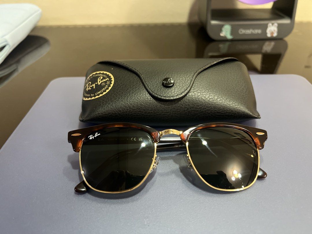 Rayban clubmaster (Category: Sunglasses & Eyewear) located in Quezon City. Submitted by chloegbnsy (Listing ID 1462305112, Image 2). Description: The selected region shows a pair of Ray-Ban Clubmaster Classic Sunglasses in a polished tortoise-on-gold frame with classic green lenses.