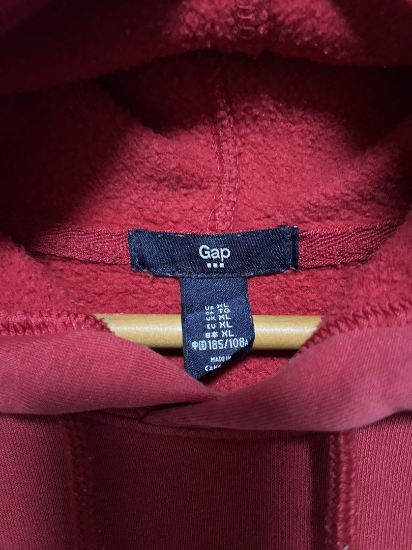 Red Gap Hoodie (Category: Hoodies) located in Tanza. Submitted by feliciano4108 (Listing ID 1462300096, Image 3). Description: - Classic red Gap hoodie - Iconic Gap logo across the chest - Front pouch pocket - Adjustable drawstring hood - Ribbed cuffs and hem - Size XL - Great for casual wear.