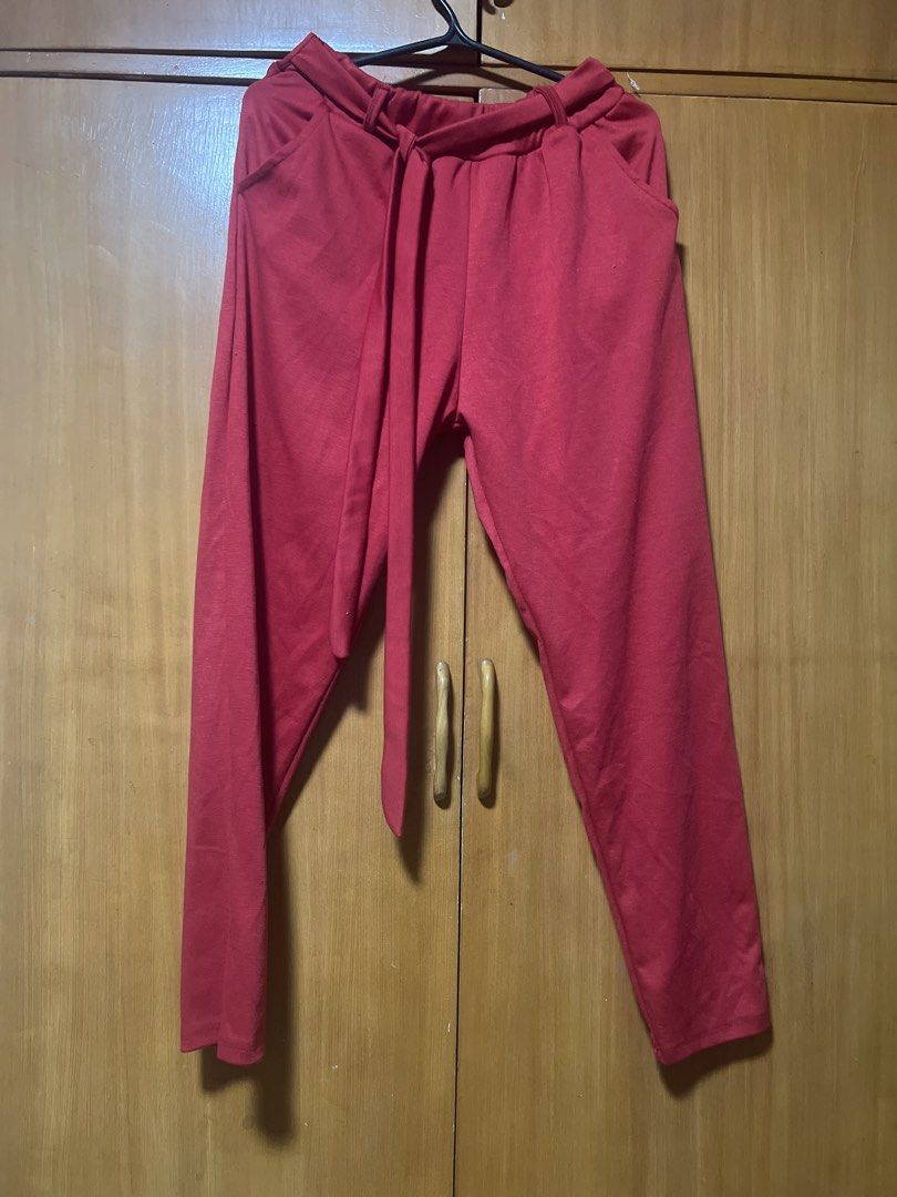 Red High-Waisted Tie-Waist Pants (Category: Other Bottoms) located in Pasig City. Submitted by zebteashoppe01 (Listing ID 1462367210, Image 1). Description: - Trendy red pants - High-waisted design - Adjustable tie waist - Functional front pockets - Flattering straight leg cut - Comfortable fabric - Versatile for casual or dressy occasions Small to medium small built 09096535540 Gcash mop Pasig Jnt .