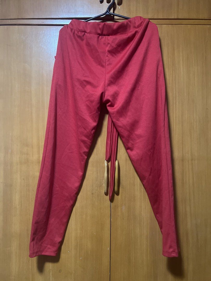 Red High-Waisted Tie-Waist Pants (Category: Other Bottoms) located in Pasig City. Submitted by zebteashoppe01 (Listing ID 1462367210, Image 2). Description: - Trendy red pants - High-waisted design - Adjustable tie waist - Functional front pockets - Flattering straight leg cut - Comfortable fabric - Versatile for casual or dressy occasions Small to medium small built 09096535540 Gcash mop Pasig Jnt .