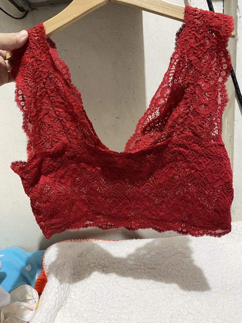 Red Lace Bralette with Zipper Front (Category: Undergarments & Loungewear) located in Manila. Submitted by resi.diaz (Listing ID 1462346358, Image 3). Description: Red lace bralette. Has a zipper in the front. Scalloped lace trim along the edges. Comfortable and stylish. Great for layering or wearing on its own. Shows off a bit of skin with the lace detail. Good for casual wear or a night out..
