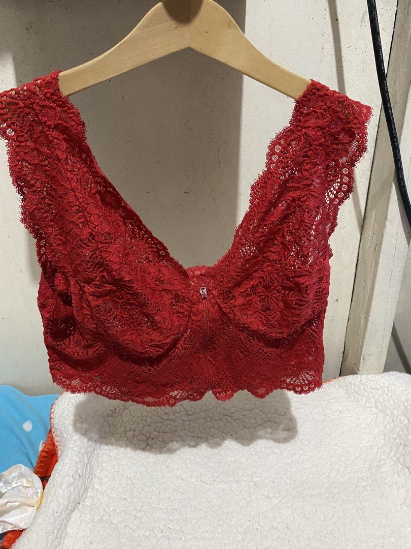 Red Lace Bralette with Zipper Front (Category: Undergarments & Loungewear) located in Manila. Submitted by resi.diaz (Listing ID 1462346358, Image 1). Description: Red lace bralette. Has a zipper in the front. Scalloped lace trim along the edges. Comfortable and stylish. Great for layering or wearing on its own. Shows off a bit of skin with the lace detail. Good for casual wear or a night out..