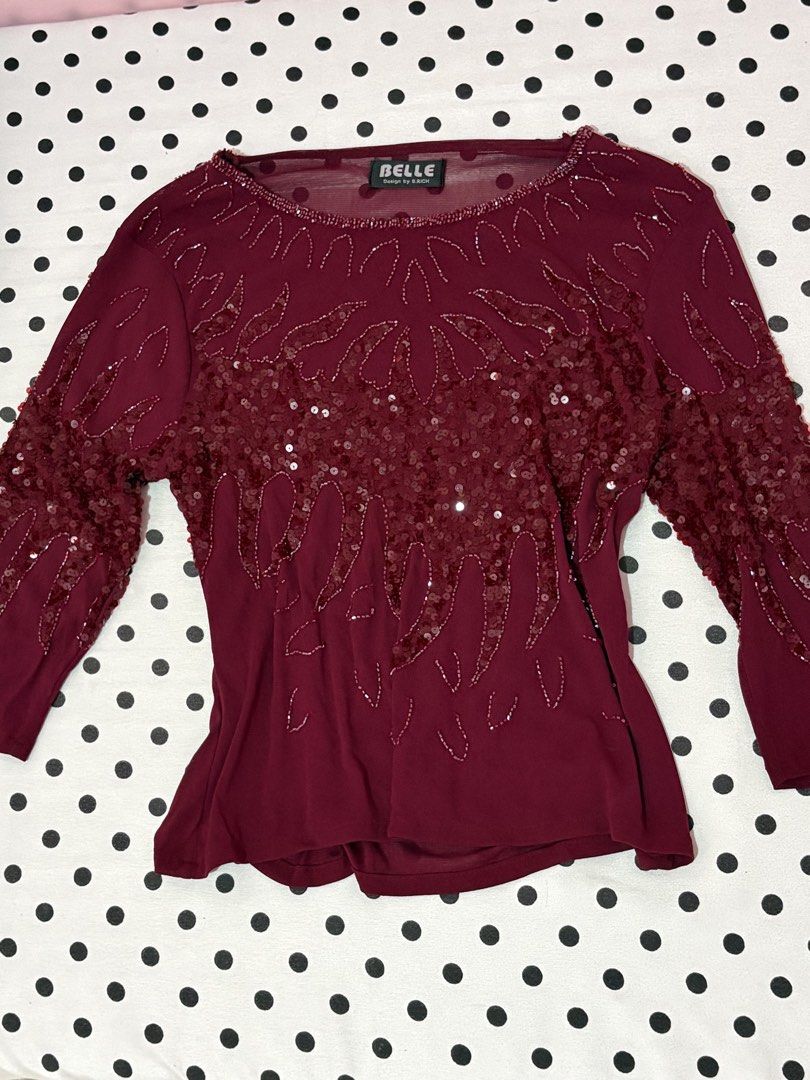red longsleeve top (Category: Longsleeves) located in Baliuag. Submitted by ji.glam (Listing ID 1462329084, Image 2). Description: - never been used - very flattering - perfect for occasions size: small .
