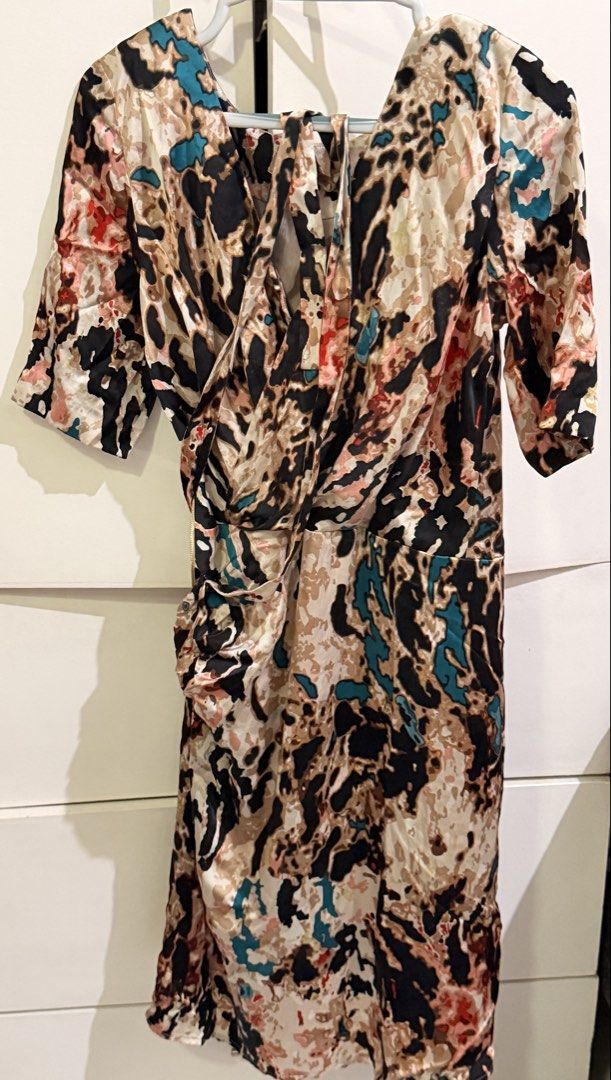 Reversible Dress (Category: Dresses) located in Mandaluyong City. Submitted by mawees_closet (Listing ID 1462326617, Image 1). Description: A printed dress for a special occasion that you can wear, front or back .