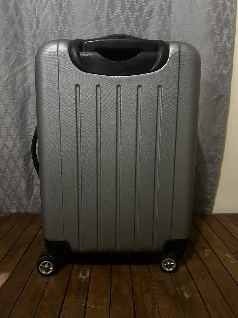 Ricardo Beverly Hills Silver Hardside Spinner Luggage (Category: Luggage) located in Taguig. Submitted by ghiebow06 (Listing ID 1462376612, Image 3). Description: Dimensions: H- 21 1/2 W- 15 D- 8 1/2 (1.5in extra depth) - Silver Ricardo Beverly Hills expandable hardside spinner luggage - Four spinner wheels for effortless gliding - Retractable handle for easy pulling - Convenient side handle for carrying - Secure zipper closure - Shows minor scuf