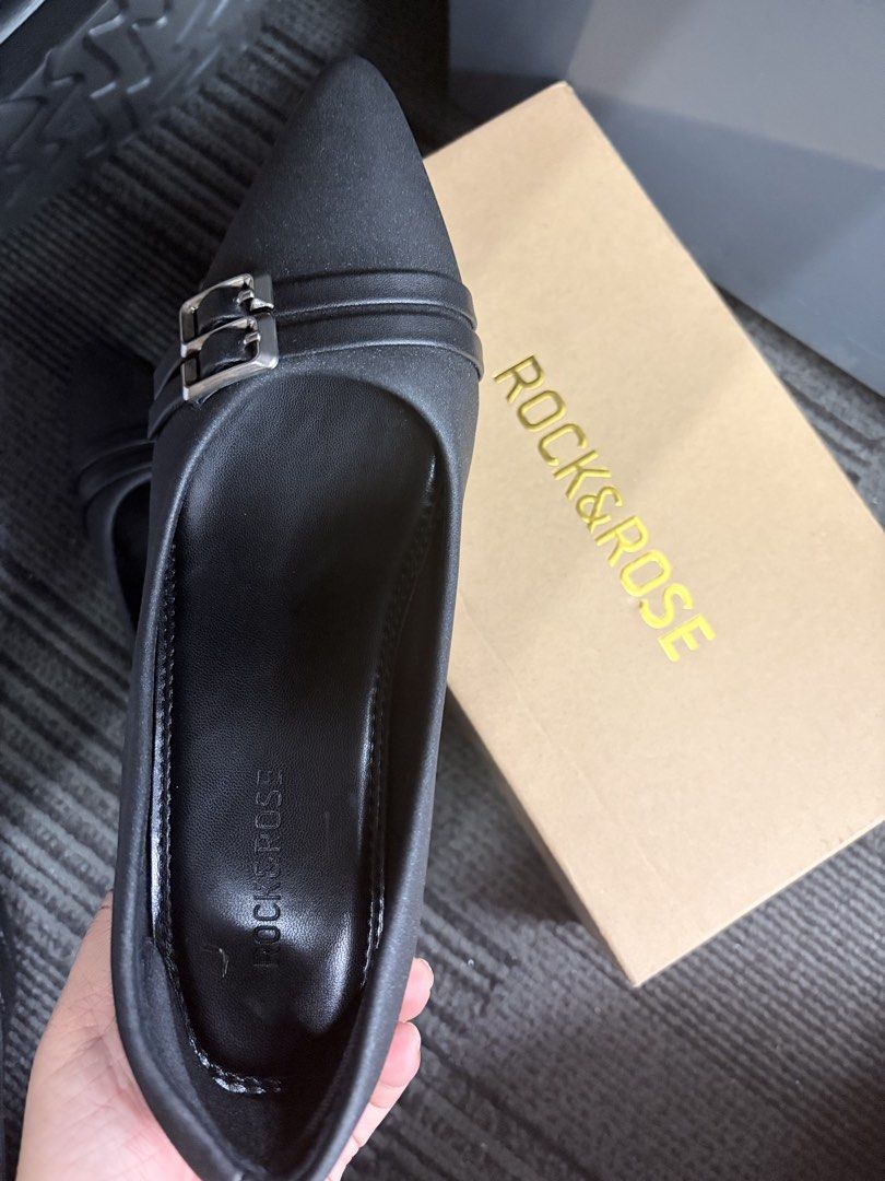 Rock & Rose Black Heels Size 37 (Category: Heels) located in Caloocan City. Submitted by mntnzchsk (Listing ID 1462264377, Image 2). Description: 2 inches Pointed heels Can be use as school shoes or office shoes Used it twice sa office lang - Size: 37 - Features: Buckle detail on front strap - Includes: Original box - Purchase Location: SM Store Rfs: I prefer to use flat shoes na lang.