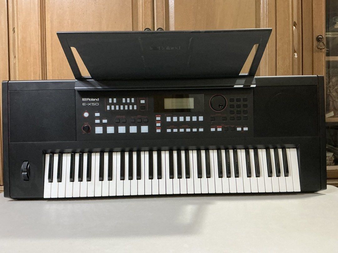 Roland E-X50 Keyboard (Category: Musical Instruments) located in Manila. Submitted by goodgyalriri (Listing ID 1462294279, Image 2). Description: Roland E-X50 61-Key Interactive Arranger Keyboard Selling my Roland E-X50 in good, well-maintained condition. Perfect for beginners, home musicians, performers, or anyone looking for a versatile keyboard with built-in sounds and accompaniment. Details: * 61 full-size keys with touch response * 433 Rolan