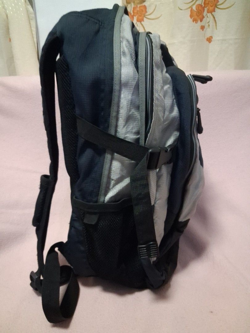 Roots Backpack Navy Blue Grey (Category: Backpacks) located in Angeles City. Submitted by anneps (Listing ID 1462406452, Image 3). Description: - Roots backpack in navy blue and grey. - Multiple zippered compartments for easy organization. - Padded shoulder straps ensure comfortable carrying. - Side mesh pockets are perfect for water bottles. - Durable material built to last. - Zippers are in good working condition. - Ideal for school, work, or d