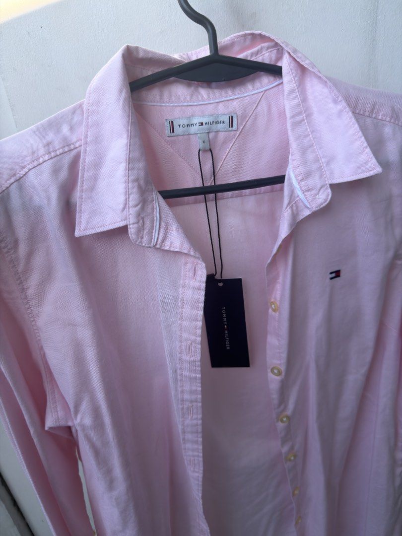 RUSH SALE!!! Tommy Hilfiger (Category: Blouses) located in Manila. Submitted by joyserrano (Listing ID 1462438818, Image 2). Description: 🎀 FOR SALE | BRAND NEW 🎀 Tommy Hilfiger 💗 👚 For Women — Medium to Large 🌸 Color: Baby Pink ✨ Brand New & Never Used 🎁 Perfect for gifting! Reason for selling: Decluttering 🧺.