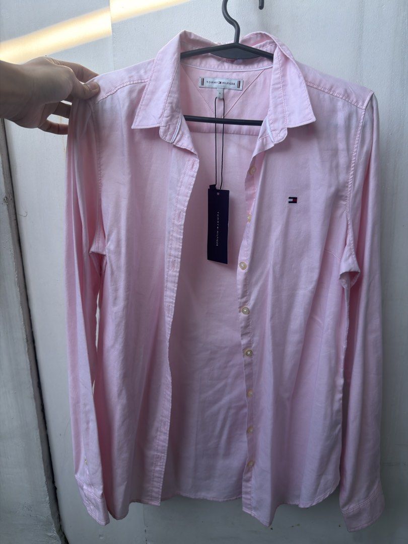RUSH SALE!!! Tommy Hilfiger (Category: Blouses) located in Manila. Submitted by joyserrano (Listing ID 1462438818, Image 1). Description: 🎀 FOR SALE | BRAND NEW 🎀 Tommy Hilfiger 💗 👚 For Women — Medium to Large 🌸 Color: Baby Pink ✨ Brand New & Never Used 🎁 Perfect for gifting! Reason for selling: Decluttering 🧺.