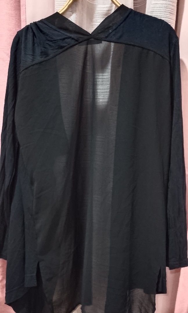 Sandro open-front black cardigan (Category: Coats, Jackets and Outerwear) located in Cabanatuan. Submitted by miss.maia (Listing ID 1462399031, Image 3). Description: The item pictured is a Sandro open-front black cardigan, featuring a draped, lightweight design with a mix of fabric textures along the lapels and a sheer fluid back paneled effect..