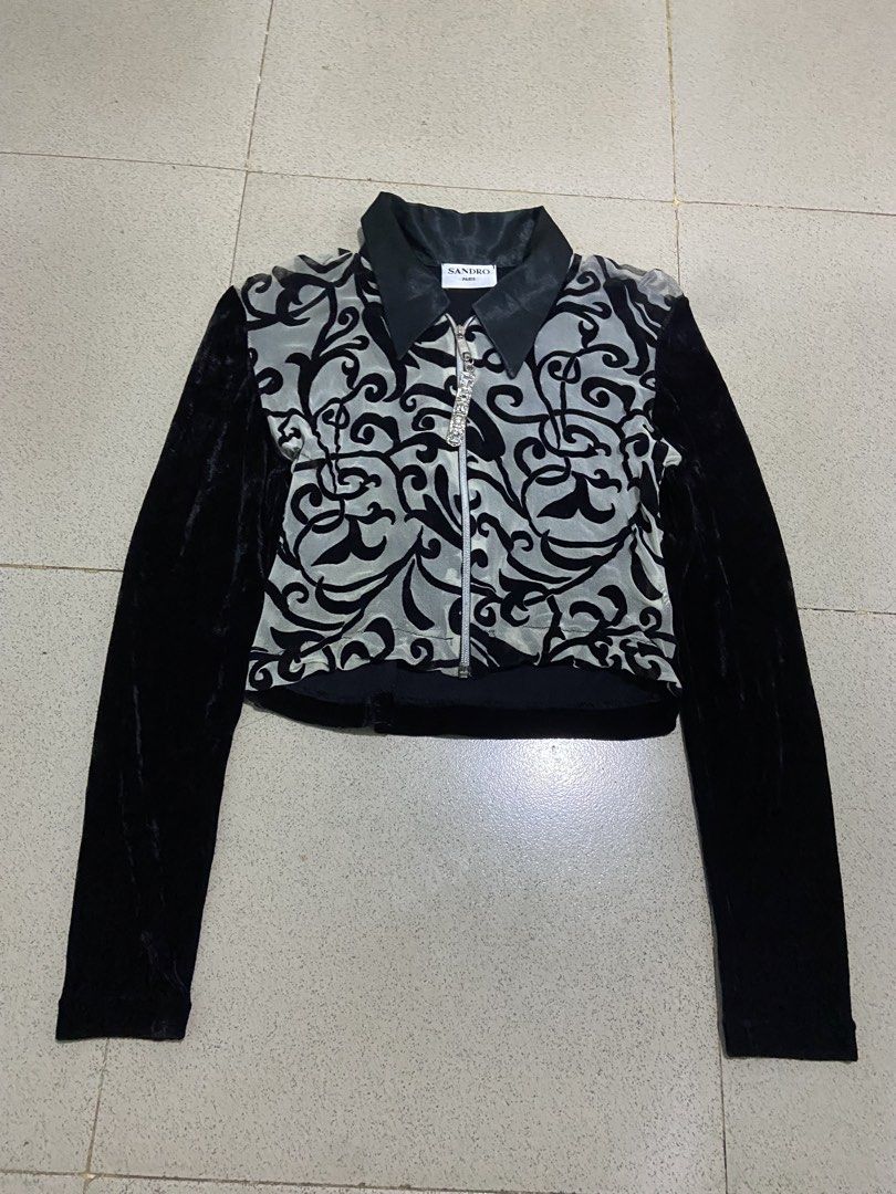 Sandro Paris Black Velvet & Mesh Cropped Jacket (Category: Coats, Jackets and Outerwear) located in Bulacan. Submitted by rrthrifts (Listing ID 1462353809, Image 1). Description: - Sandro Paris cropped jacket - Velvet sleeves - Sheer mesh front with black baroque pattern - Zip-up closure with decorative charm - Black satin collar - Size 1 - Made in France.