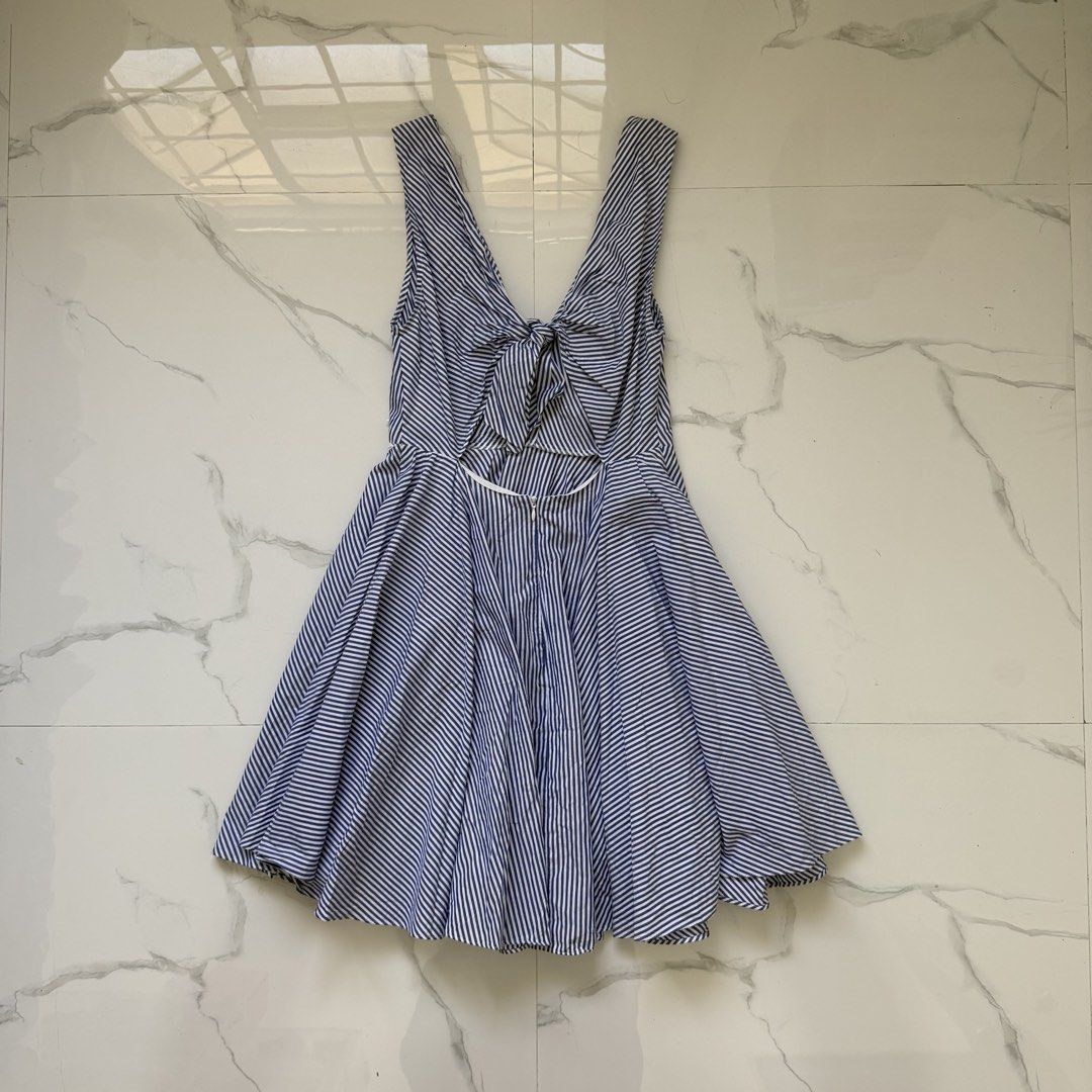 Sandro Paris Ribbed Cut Out Back Dress (Category: Dresses) located in Santo Tomas. Submitted by the580closet (Listing ID 1462347626, Image 3). Description: - Size XS 16 inches - chest 35 inches - length.
