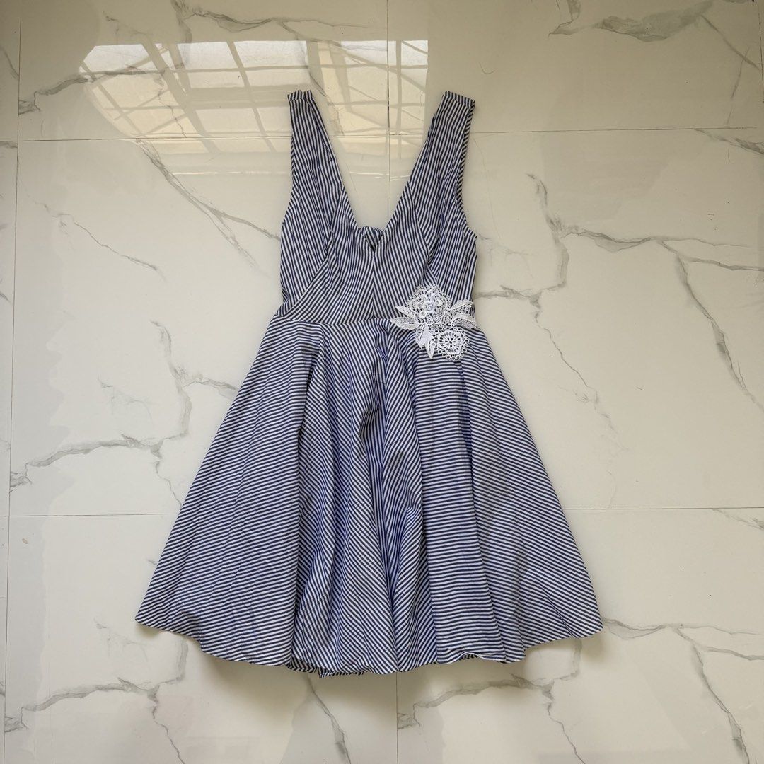 Sandro Paris Ribbed Cut Out Back Dress (Category: Dresses) located in Santo Tomas. Submitted by the580closet (Listing ID 1462347626, Image 1). Description: - Size XS 16 inches - chest 35 inches - length.