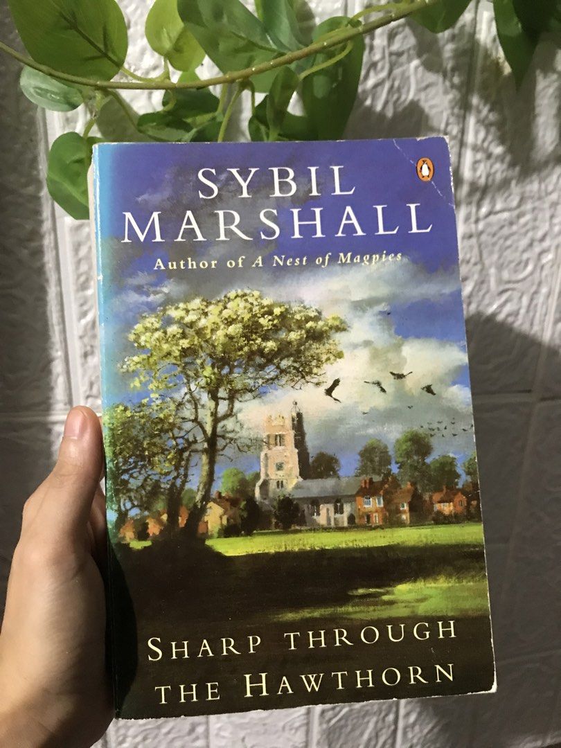 Sharp Through The Hawthorn by Sybil Marshall (Category: Storybooks) located in Pilar. Submitted by dhelsomera20308 (Listing ID 1462393081, Image 1). Description: - Title: Sharp Through The Hawthorn - Author: Sybil Marshall - Sequel to: A Nest of Magpies - Story: Follows Fran and William navigating their childhood home. - Setting: East Anglian community - Genre: Sprawling, passionate village saga.