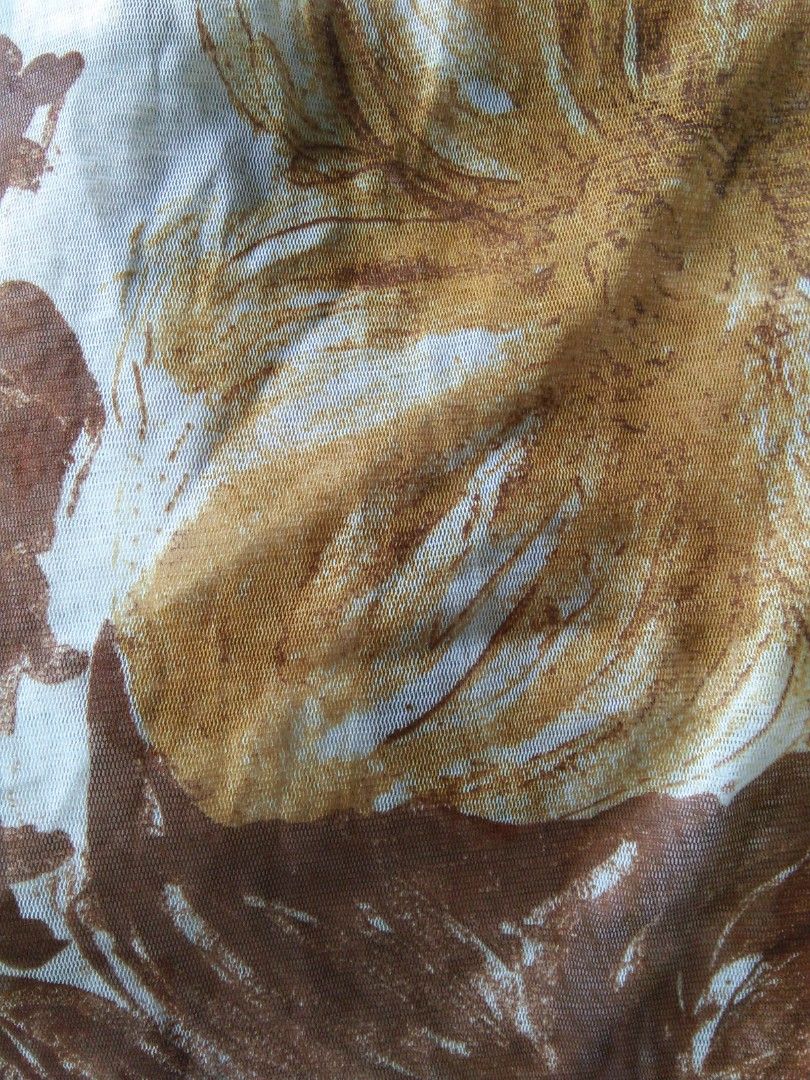 Sheer Floral Print Collared Button-Up Top (Category: Blouses) located in Meycauayan. Submitted by pau.trading (Listing ID 1462397069, Image 3). Description: - Sheer mesh fabric with a brown and tan floral print on white. - Collared neckline and button-up front. - Short sleeves. - Lightweight and airy. - Ideal for layering over camisoles or bralettes. note: last photo for styling inspo only.