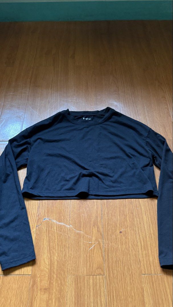 SHEIN Black Long Sleeve Cropped Top Size S (Category: Longsleeves) located in Antipolo. Submitted by japanese.siomai (Listing ID 1462363696, Image 1). Description: - Brand: SHEIN - Style: Long sleeve crop top - Color: Black - Material: 95% Polyester, 5% Elastane - Features: Comfortable, stretchy - Occasion: Casual wear, layering - Styling: Pairs well with jeans or shorts.