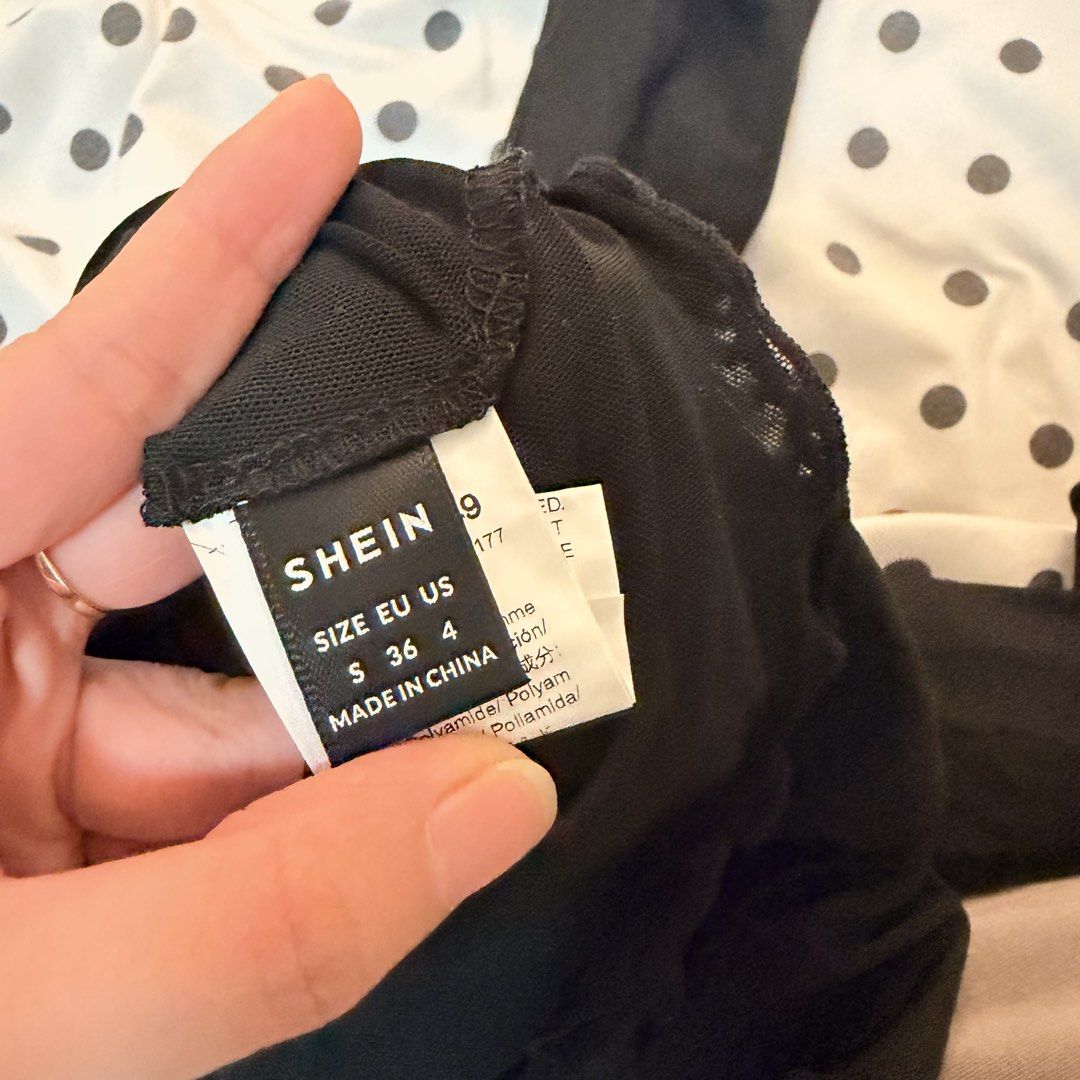 SHEIN Black Off-Shoulder Ruffle Mesh Long Sleeve Top (Category: Blouses) located in Pasay City. Submitted by notellyyyy (Listing ID 1462279261, Image 2). Description: - SHEIN black mesh top - Off-shoulder design with ruffle trim - Long sleeves with ruffle cuffs - Asymmetrical hemline - Super cute and edgy style - Ideal for going out or dressing up an outfit.