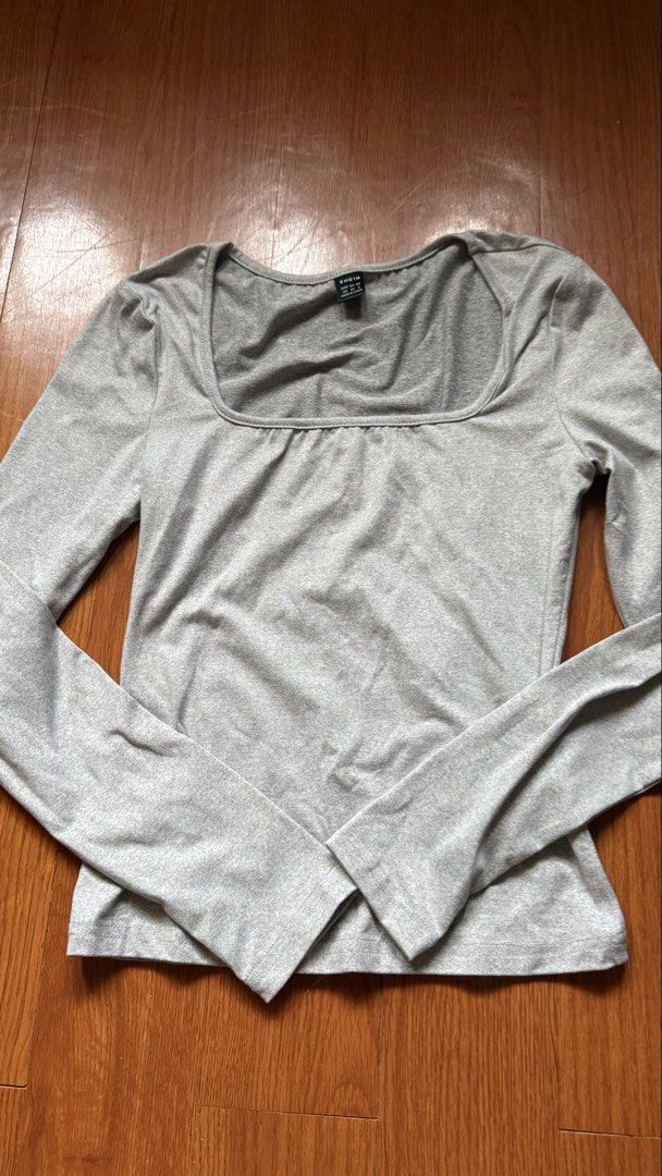 SHEIN Grey Square Neck Long Sleeve Top (Category: Longsleeves) located in Antipolo. Submitted by japanese.siomai (Listing ID 1462363575, Image 1). Description: - SHEIN grey long sleeve top - Square neckline - Stretchy material - Versatile: perfect for layering or wearing alone.