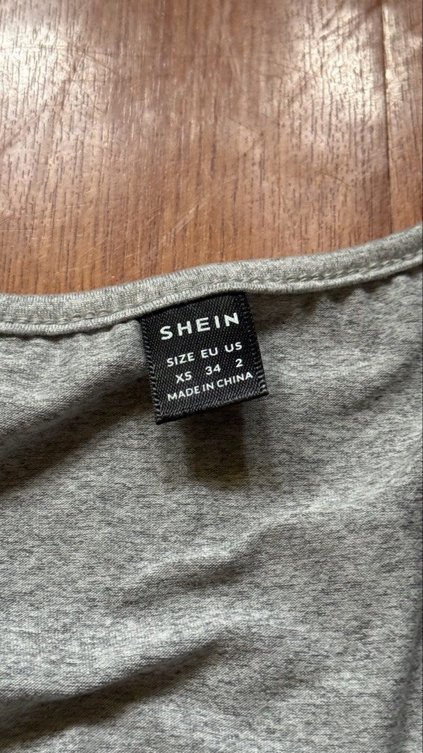 SHEIN Grey Square Neck Long Sleeve Top (Category: Longsleeves) located in Antipolo. Submitted by japanese.siomai (Listing ID 1462363575, Image 2). Description: - SHEIN grey long sleeve top - Square neckline - Stretchy material - Versatile: perfect for layering or wearing alone.