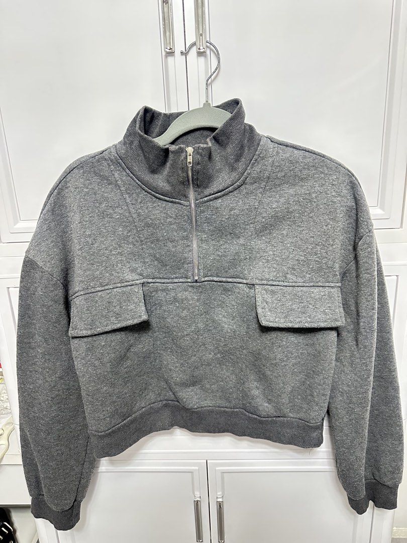 SHEIN Grey Zip Sweatshirt with Pockets Jacket (Category: Coats, Jackets and Outerwear) located in Quezon City. Submitted by jeydeegmr (Listing ID 1462411263, Image 1). Description: - Grey cropped sweatshirt - Quarter zip neckline - Two front pockets - Ribbed cuffs and hem - Comfy and casual style - Ideal for layering or wearing alone - Easy to pair with jeans or leggings.